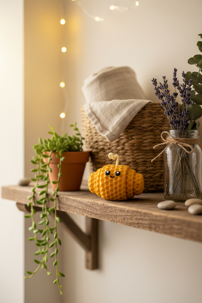 Golden candle on rustic shelf